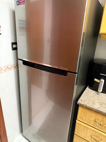 Stainless Steel Double-Door Refrigerator in Good Condition