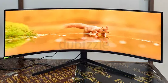 The Samsung Odyssey G9 QLED is a massive 49-inch super ultra-wide curved gaming monitor. Featuring