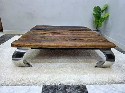 Solid reclaimed wood coffee table with curved chrome legs