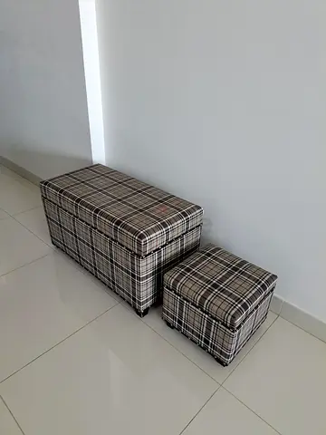 Pair of plaid storage ottomans / footstools - good condition