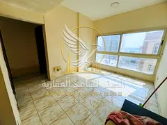 One-bedroom apartment with a living room for rent in Al Nabaa, Sharjah. The unit features a spacious