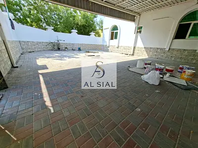 Spacious 4 bedroom hall with all master rooms maids room lawn & covered parking area