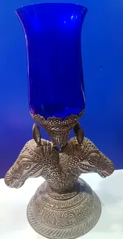 Blue glass vase on ornate metal stand-36cm height