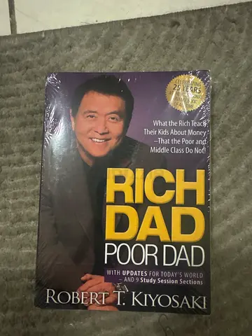 Rich Dad Poor Dad by Robert T. Kiyosaki (Paperback)