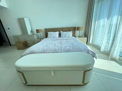 King bed set with upholstered headboard, bedside tables and storage bench