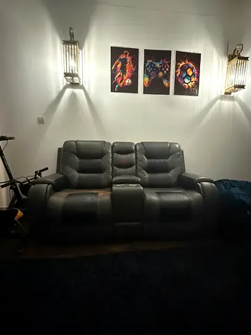 Recliner sofa works perfectly, but with somewhere and tear