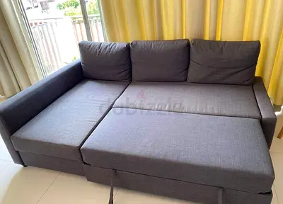 Gray L-shaped Sofa Bed with Storage — Good Condition