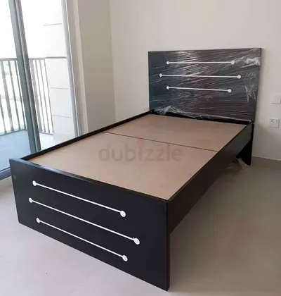 Brand New wooden twin size Bed Available
