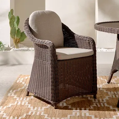 Brand new two pieces Outdoor arm chairs rattan no coushions