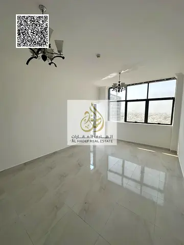 Two-bedroom apartment with a living room for annual rent, including parking, a gym, and a swimming