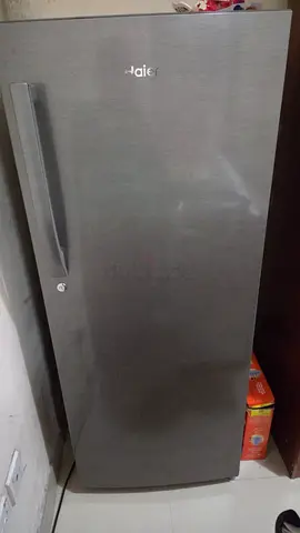 Haier single-door upright freezer/refrigerator in good condition, available for urgent sale AED 300
