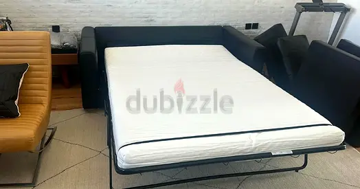 Black leather sofa bed with mattress - good condition