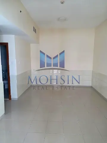 Distress Deal Hot Offer" 2 BHK Apartment Garden & City View For Rent With Parking At Prime Location of Ajman Pearl Towers.