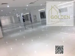 Large Logistics Warehouse with Mezzanine for Rent on a Main Road in Ajman Industrial Area | Suitable