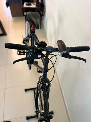 Used hybrid/commuter bike in good condition - comfortable saddle, lights included