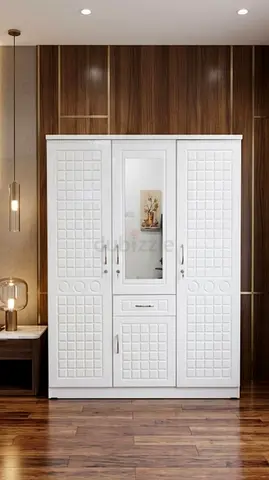 I'm selling brand new 3door cabinet White colour made in UAE