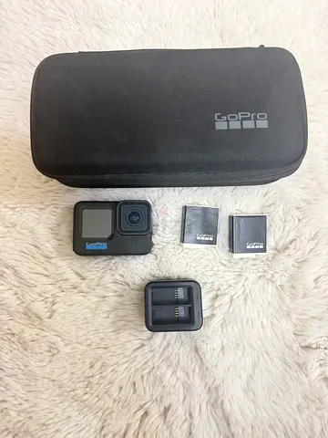 GoPro HERO 11 action camera with case, 2 spare batteries and dual charger with micro memory card