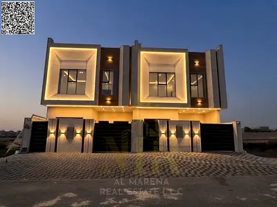 An upscale villa for sale in Al Helio, Ajman, featuring an elegant design and high-quality finishes.