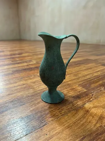 Antique metal pitcher decorative