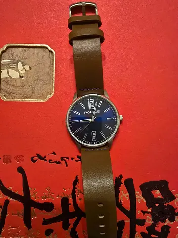 Police men's analog watch with brown leather strap, working condition