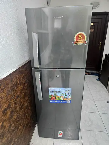Silver double-door refrigerator with bottom freezer - good condition