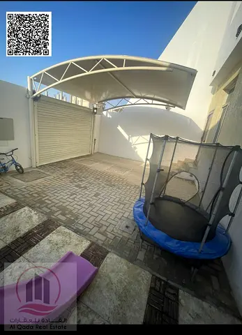Villa for sale in Al Zahiyah area, Ajman, including electricity, water, and air conditioning (3 mas