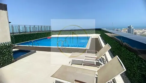 2-Bedroom Apartment with Living Room in Al Qasba, Sea-View Balcony, Two Master Bedrooms, Free Parking, Gym and Pool, One Month Free