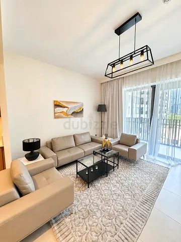 Modern beige leather sofa set with armchairs