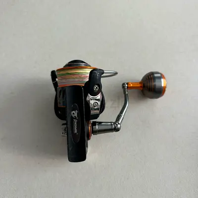 Two spinning fishing reels - used, good working condition
