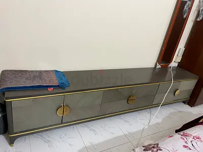 Long low TV cabinet / media console with storage - grey and gold finish