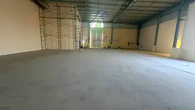 5,365 sq. ft. warehouse in Al Sajaa, 36 kW power, main road, 2 gates, bathroom, fire safety & Civil