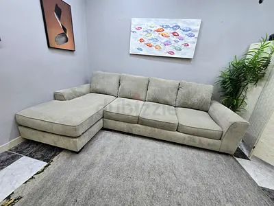 Light grey L-shaped 4-seater sofa - good condition