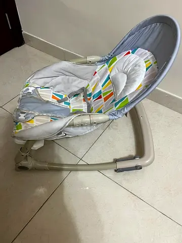 Gently used baby rocker/bouncer with harness and recline — good condition
