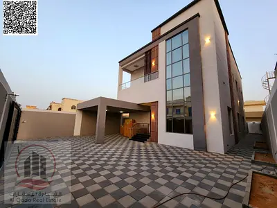 Villa for sale in Ajman, Al Rawda area (2), 5000 feet ( 5 master bedrooms, majlis + 2 halls, equipp