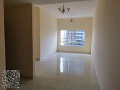 One bedroom and living room in Emirates City with a closed kitchen and parking in a very prime locat