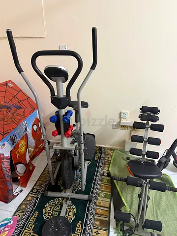 Multi-function home elliptical trainer with weight bench and dumbbells set