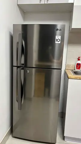 LG Stainless Steel Top Freezer Refrigerator - 2 Door, Good Condition