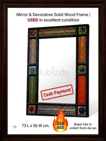 Beautiful mirror framed by multi colored solid wood