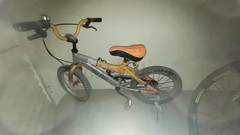Kids 16-inch yellow children's bike - good used condition, tube need replacement