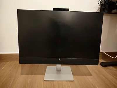 HP 27-inch Monitor with built-in webcam and speakers