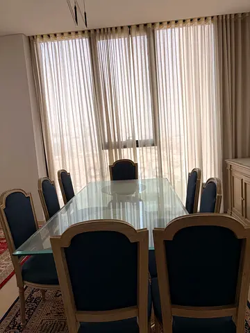 Glass-Top Dining Table with 8 Upholstered Chairs