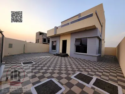 Villa for sale in Ajman, Al Helio 2 area, including registration fees (3 master bedrooms + large living room with sinks + large hall + maid's room + e