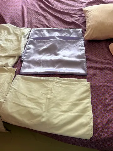 Used beige bed sheet set with matching pillowcases