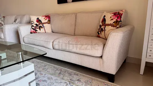 Beige 3-seater fabric sofa in good condition