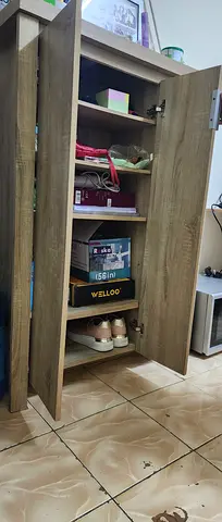 Tall wooden shoe/storage cabinet with multiple shelves - used