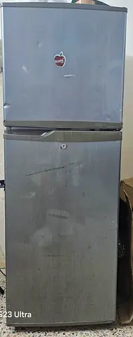 Used double-door fridge - working, some dents and scratches