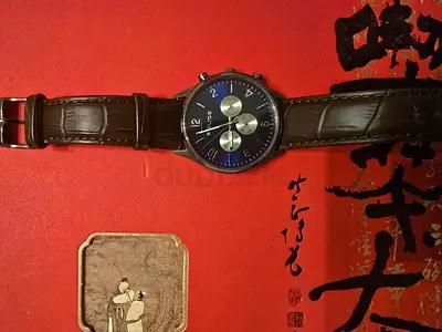 Men's quartz chronograph watch with brown leather strap