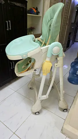 Used adjustable baby high chair