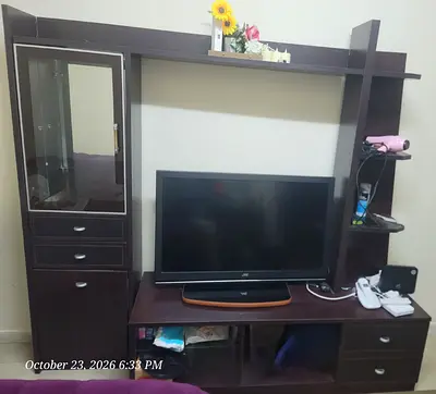 TV unit full set with TV, featuring a glass-door side cabinet, open shelving, drawers