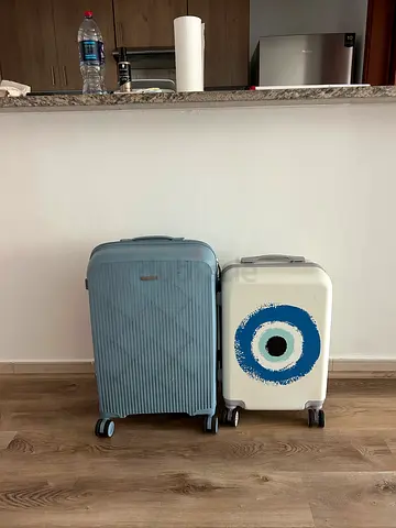 Must collect TODAY - Set of 2 hard-shell carry-on suitcases (small + medium) — light blue and white